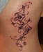 Tattoo Ranke mit Calla-Blüten
